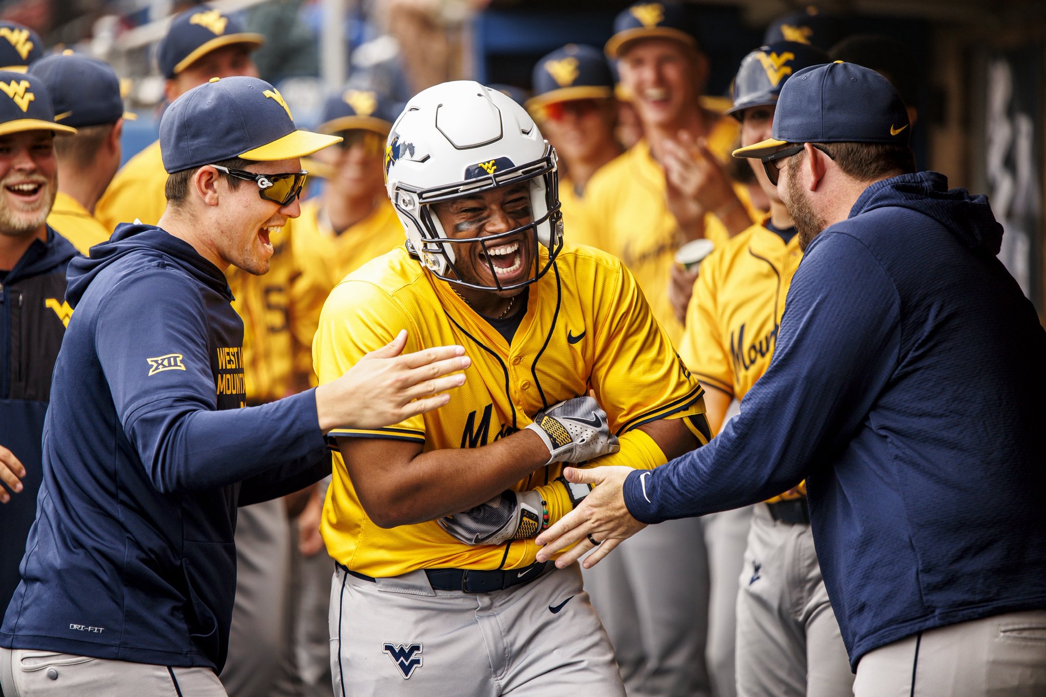 That's a sweep: No. 15 WVU mercy rules No. 7 Kansas, 13-2